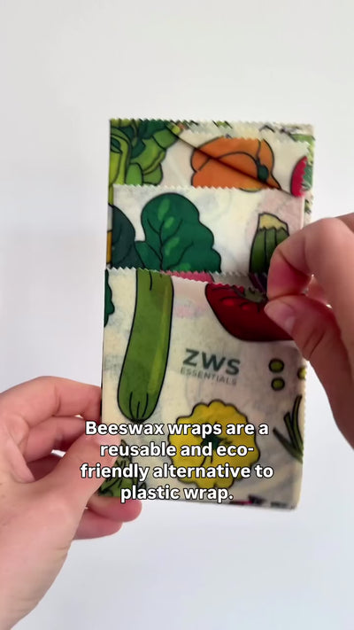 Creator Clara unfolds the Veggies beeswax wrap and shows the three sizes