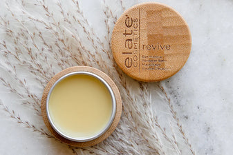 elate cosmetics eye makeup remover balm in a bamboo covered tin