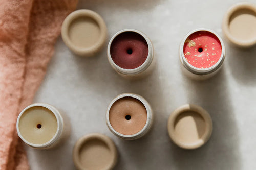 Top view of zero waste lip balms in different shades
